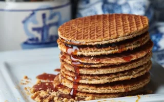 kuliner amsterdam lezat, hidangan khas belanda, makanan eropa populer, cita rasa autentik, wisata kuliner amsterdam